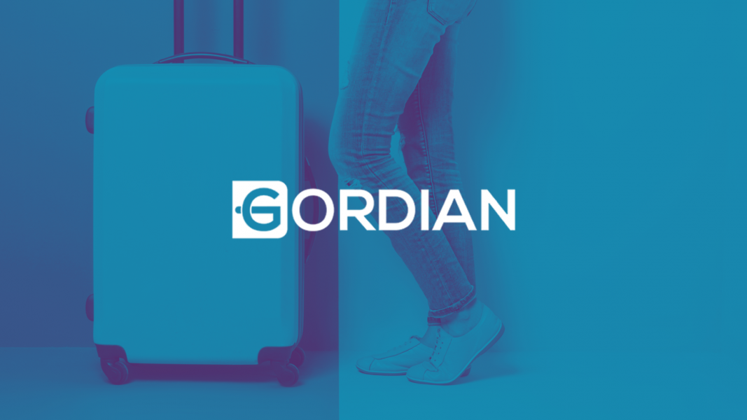 gordian logo on blue background of a person standing with luggage
