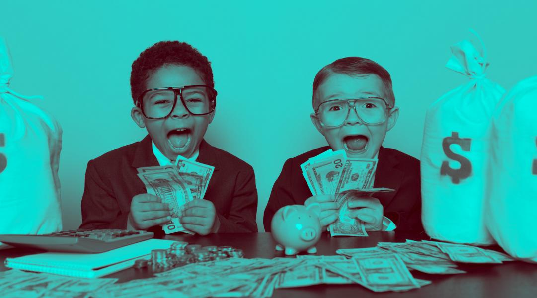 two kids holding money